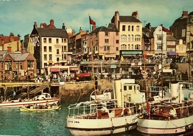 This postcard shows a busy harbour scene from the 1960s. Image submitted