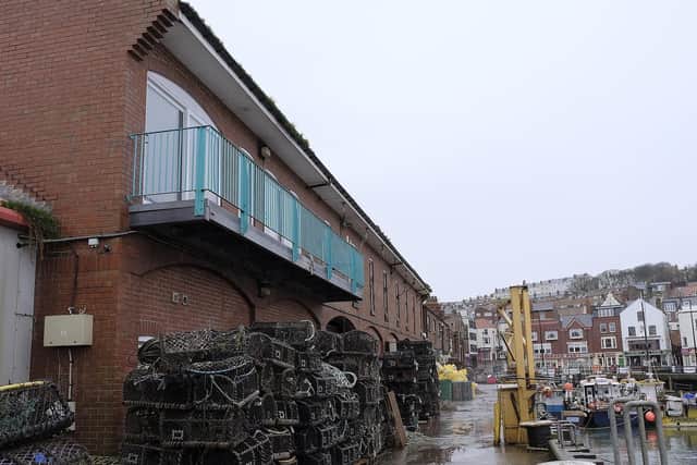 The owner wants to expand the cafe's balcony.
