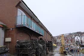 The owner wants to expand the cafe's balcony.