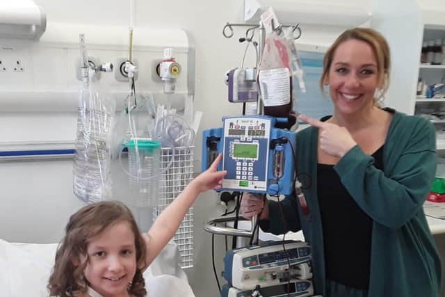 Evie Hodgson and her mum Tina with the donor cells.