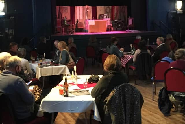 People socially distanced at The Milton Rooms during a pre-lockdown event.