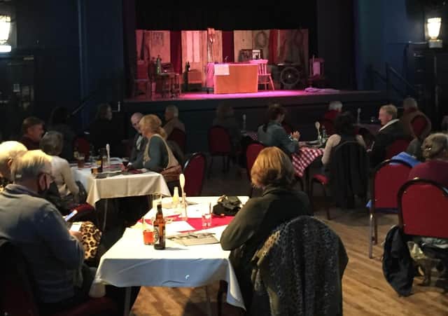 People socially distanced at The Milton Rooms during a pre-lockdown event.