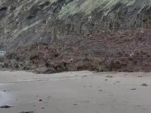 Parts of cliff fallen onto beach at Runswick Bay.
