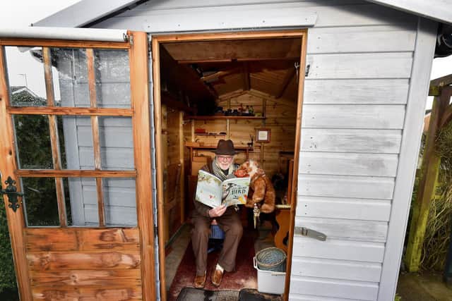 Robert tries to wear a different hat each time he reads a story. Pic: Richard Ponter