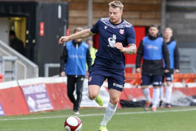 Josh Barrett on the attack in Scarborough Athletic’s draw at FC United of Manchester