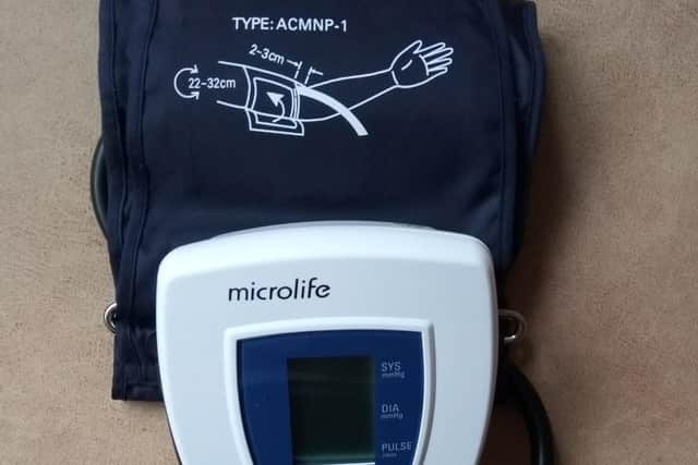 A blood pressure monitor can be used to check for hypertension.