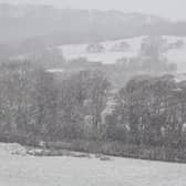 Snow falling on the North York Moors this morning