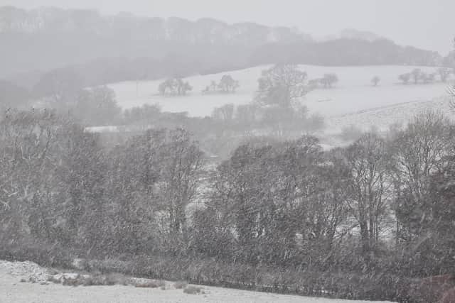 Snow falling on the North York Moors this morning