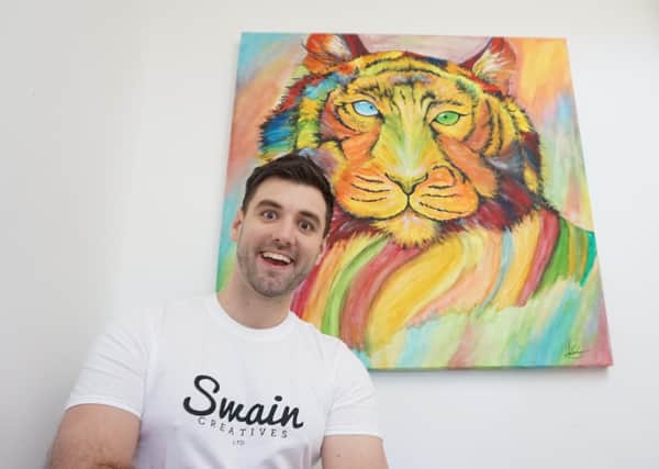 Ryan Swain with his artwork entitled Carnivore Of Colours.