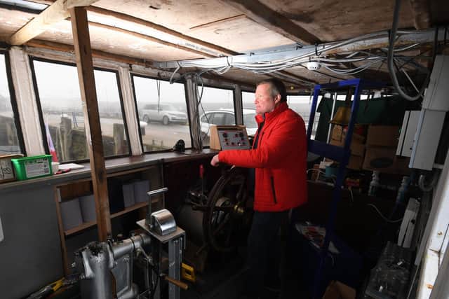 Heath Samples behind the wheel of the Regal Lady, a Little Ship of Dunkirk, as she readies to launch as a floating museum. Picture by Simon Hulme