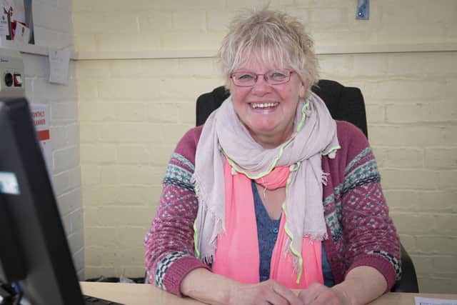 Trish sat at one of the busiest desks in Scarborough