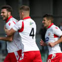 CAPTAIN COATES: Harry Coates, above on the ball against FC United of Manchester, has expressed his pride at being named vice captain of Scarborough Athletic