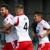 CAPTAIN COATES: Harry Coates, above on the ball against FC United of Manchester, has expressed his pride at being named vice captain of Scarborough Athletic