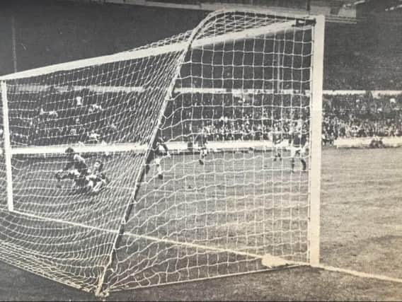 Boro’s extra-time winner as Malcolm Thompson (left) slides the ball past Wigan keeper Dennis Reeves. Picture: Steve Adamson