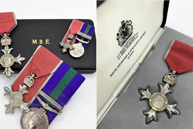 Mr Booth's MBE and war medals are going up for auction.