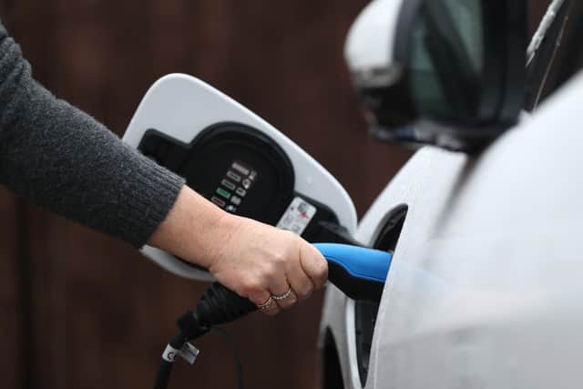 An electric car charging point.