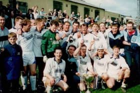 Whitby Town show off the Northern League title silverware after a 7-0 win against South Bank at Ferryhill