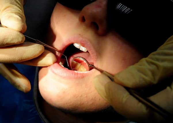 207,730 people aged 18 and over were seen by a dentist or orthodontist in the two years to the end of December. Photo: PA Images
