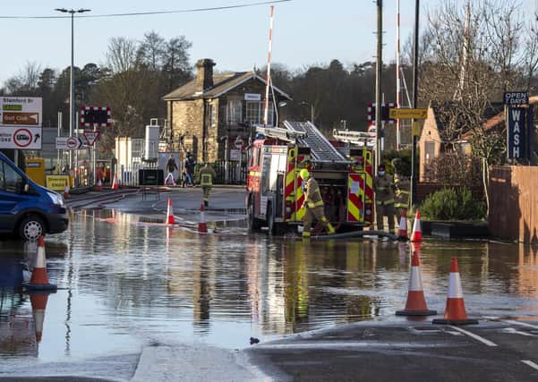 Fire crews pump water from Church Street in Norton during the February flooding. Picture Tony Johnson