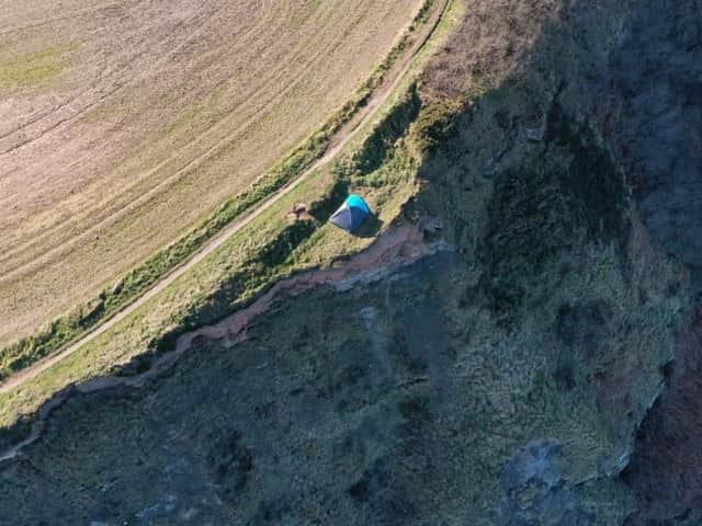 The campers with their tent on Staithes clifftops.
Picture: Alistair Smith