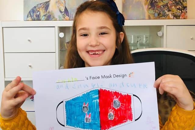 Sophia with her mask design.