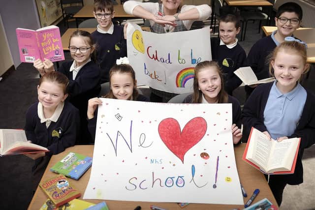 Head teacher Vicky Logan with pupils at Overdale School.