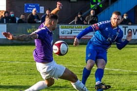 Mackenzie Heaney gets a shot away for Whitby Town