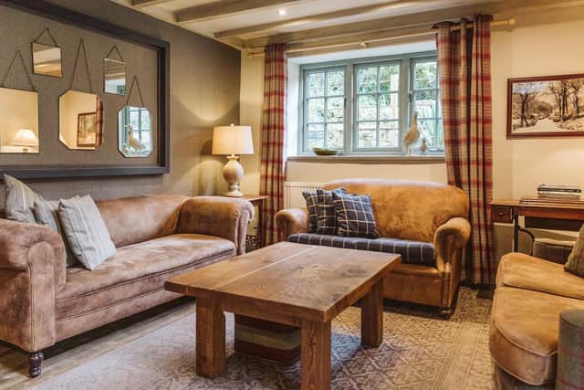 A montage of vintage mirrors adds character and interest.