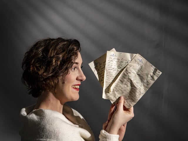 Historian Marie Woods holds love letters written at the height of WWII which were discovered under floorboards of the Esplanade Hotel, Scarborough