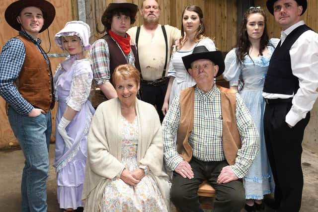 Bob Holmes, front right, in Oklahoma with Scarborough Musicals