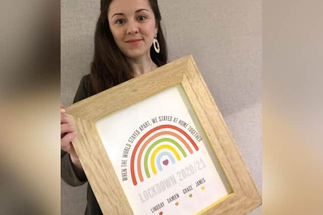 Lindsay Mason with one of her prints.