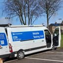 The mobile unit that is visiting rural communities as a collection point for test kits.