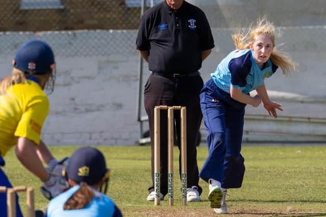 Daisy Stokoe in bowling action.