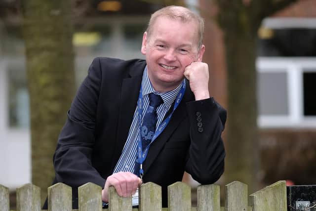 Headteacher, Stafford John.