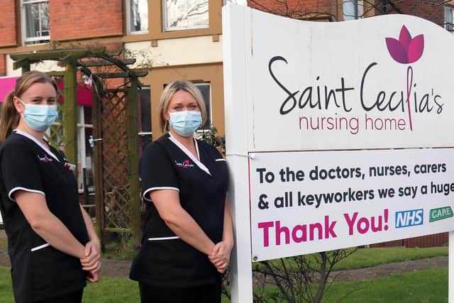 Saint Cecilia's staff with the thank you sign.