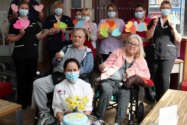 Residents and staff at Saint Cecilia’s Nursing Home created hearts to remember lost loved ones.