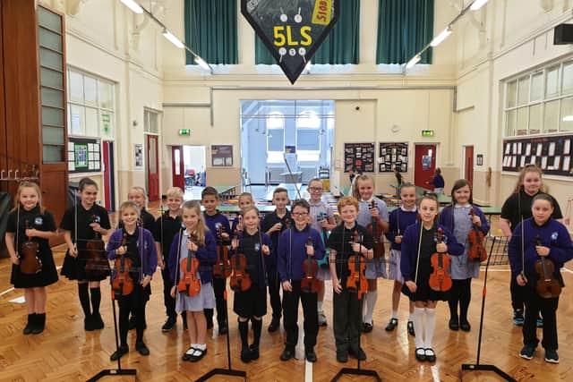 The Quay Academy string orchestra. The school advised the Department for Education in shaping the new music curriculum. Photo submitted.