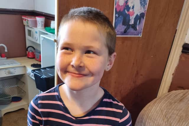 Lilly Thompson after her head shave.