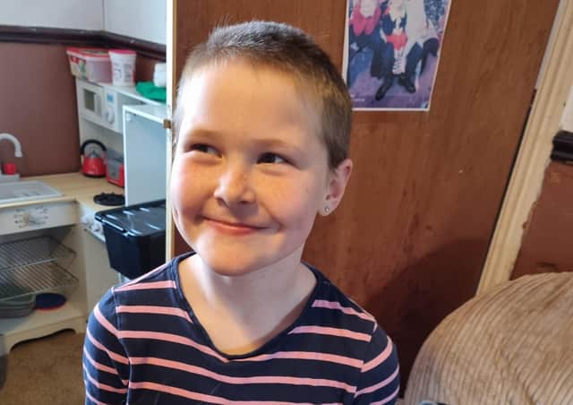 Lilly Thompson after her head shave.