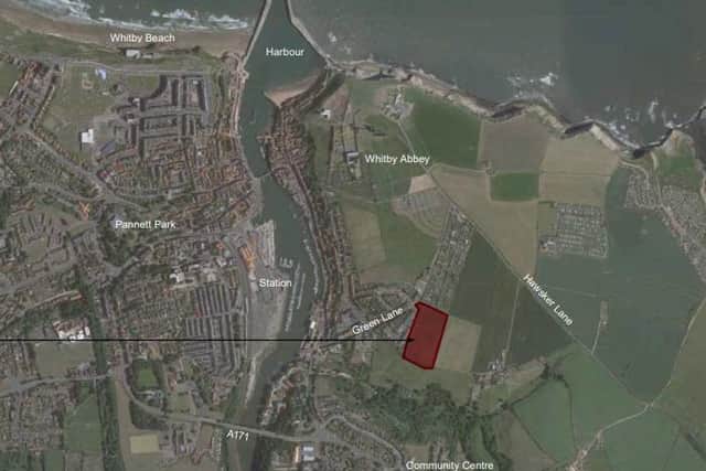 The area of land highlighted red is the proposed site for the new homes.