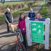 From left, County Councillor David Jeffels, Parish Council Chairman Councillor Lynda Wallis, Headteacher Jonathan Wanless with Seamer & Irton Community Primary School pupils from the same ‘bubble’ surrounding the Quiet Lane signage.
