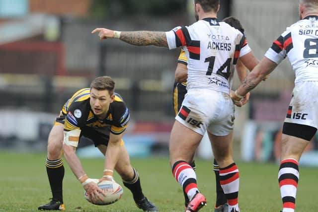 Brining looks to pick a pass. Picture: SWPix