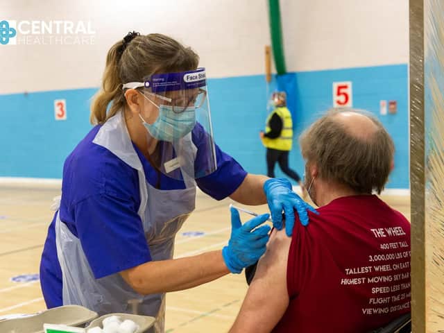 Central Healthcare Staff Nurse Diana Wilkinson carries out a vaccination at Scarborough Rugby Club.