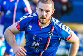 Brad Fewster is staying with Whitby Town