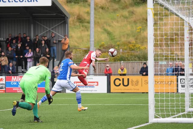 Kieran Glynn heads in the second goal in the home 2-0 win against Warrington