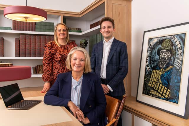 Freeman 1st Foundation (F1F) Trustees Leanne Brewis, Lesley Jackson, Stuart Sanderson. The painting depicts former Whitby lifeboat coxswain and sole survivor of the 1861 Whitby lifeboat disaster, Henry Freeman.