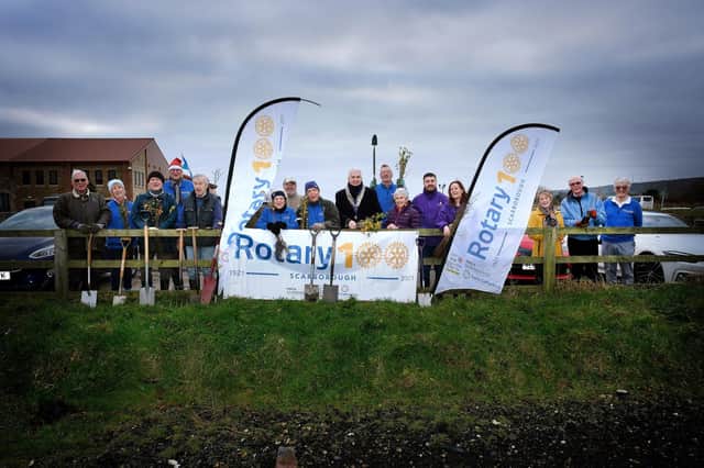 Pictures show The Rotary Club of Scarborough members and supporters with Saint Catherine’s staff at the tree planting.