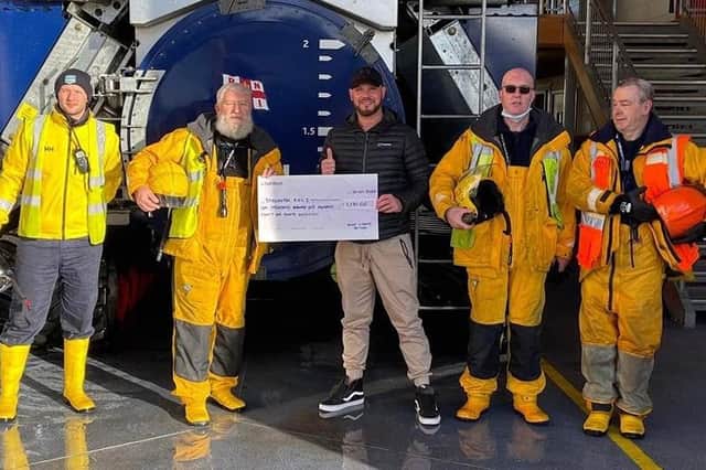 Bridlington RNLI crew members said it was a lovely surprise when Steve Tighe, the organiser of the annual Christmas day dips, paid a visit to the station to present them with a cheque for £1,181.