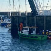 Scarborough RNLI tows a stranded fishing boat back to the harbour. (Photo: Lee Marton/Mick Cowper)