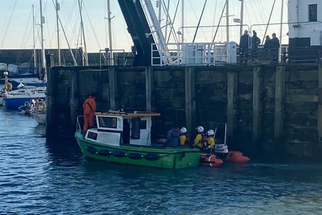 Scarborough RNLI tows a stranded fishing boat back to the harbour. (Photo: Lee Marton/Mick Cowper)